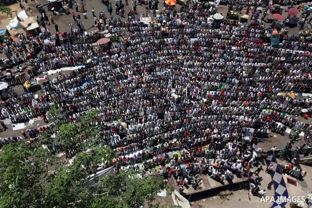 Egyptian Protesters gather for Friday prayers before a demonstration against presidential candidate Ahmed Shafiq in central Cairo's Tahrir Square, as hundreds of people gathered after the Friday noon prayer on June 8, 20...