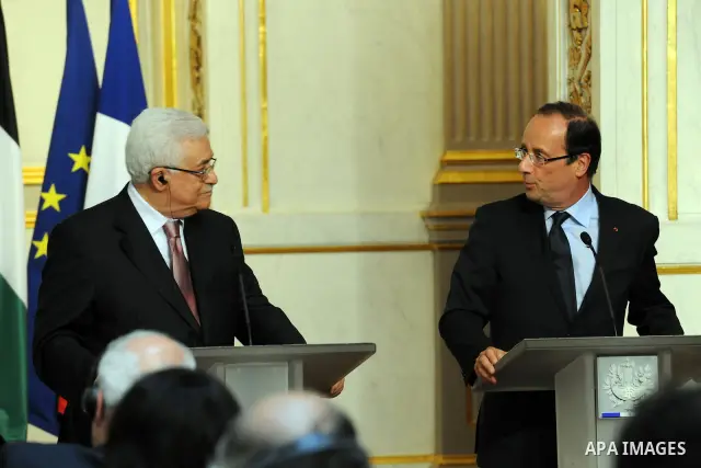 Palestinian President Mahmud Abbas (Abu Mazen) and French president Francois Hollande give a press conference following a meeting at the Elysee presidential palace in Paris on June 8, 2012. Photo by Thaer Ganaim