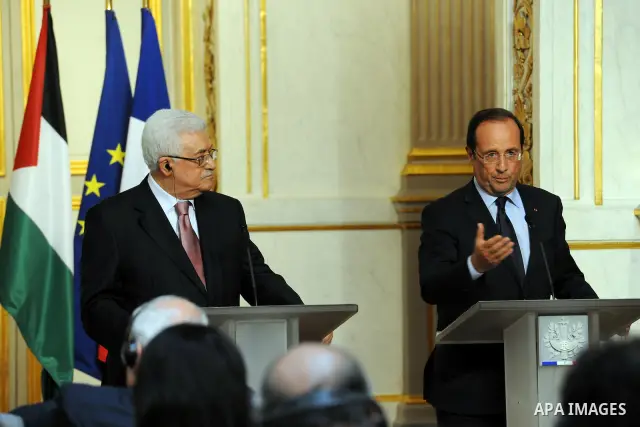 Palestinian President Mahmud Abbas (Abu Mazen) and French president Francois Hollande give a press conference following a meeting at the Elysee presidential palace in Paris on June 8, 2012. Photo by Thaer Ganaim