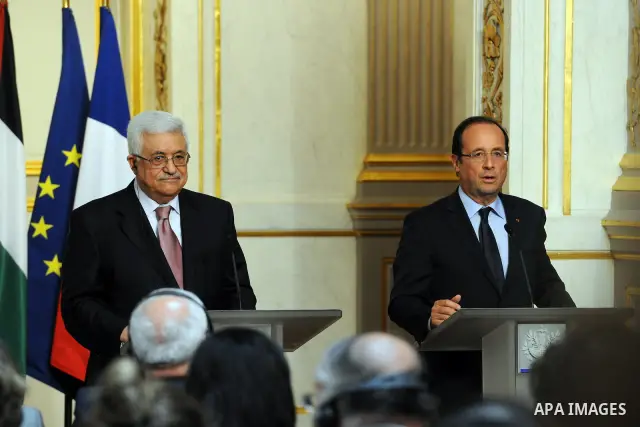 Palestinian President Mahmud Abbas (Abu Mazen) and French president Francois Hollande give a press conference following a meeting at the Elysee presidential palace in Paris on June 8, 2012. Photo by Thaer Ganaim