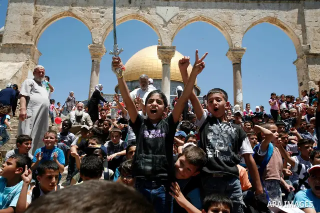 Palestinian children participate in summer camps at Al-Aqsa mosque in the old city of Jerusalem on 12 June 2012. Photo by Mahfouz Abu Turk
