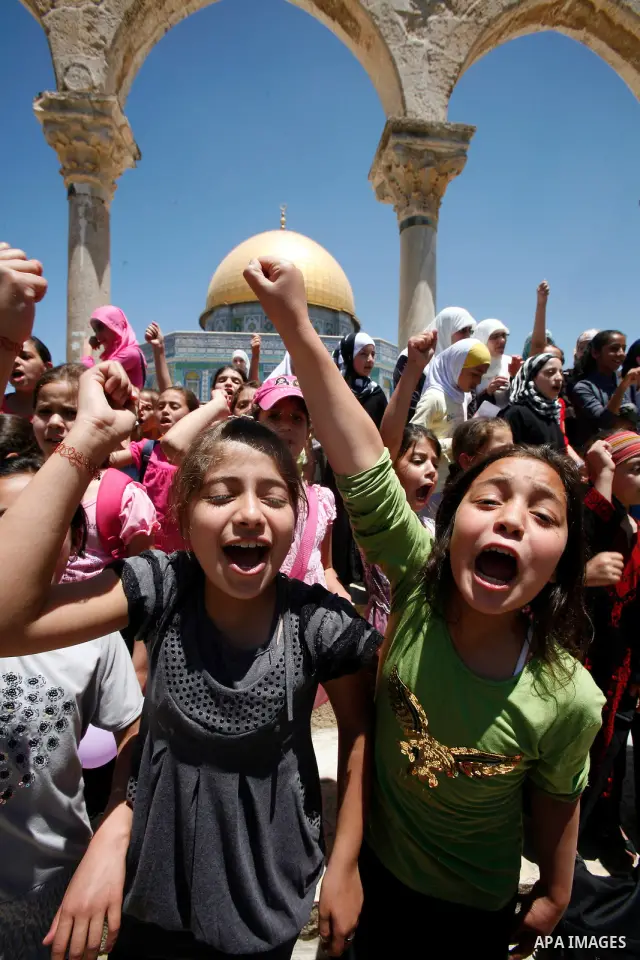 Palestinian children participate in summer camps at Al-Aqsa mosque in the old city of Jerusalem on 12 June 2012. Photo by Mahfouz Abu Turk