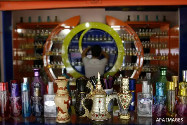 Palestinian vendor prepare perfumes in his shop for perfumes at market Rafah, southern Gaza city, on June 13, 2012. The European Union's envoy to the Palestinian Authority confirmed its support and allegiance to the peop...