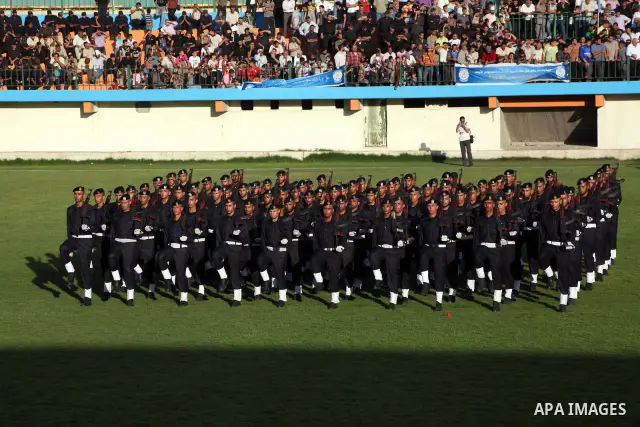 Graduating police officers march during a ceremony at the police academy in Gaza City on June 13, 2012, making them the first batch of officers to graduate after four years of training under the Hamas leadership. Hamas h...