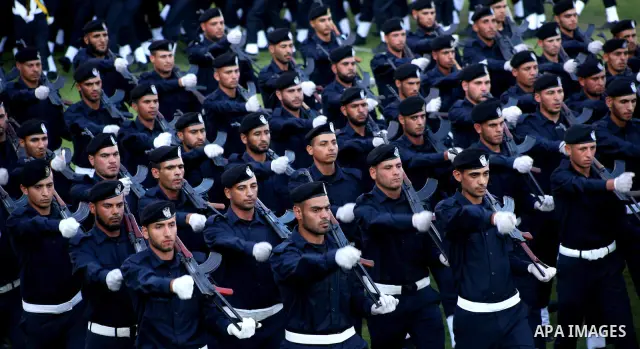 Graduating police officers march during a ceremony at the police academy in Gaza City on June 13, 2012, making them the first batch of officers to graduate after four years of training under the Hamas leadership. Hamas h...