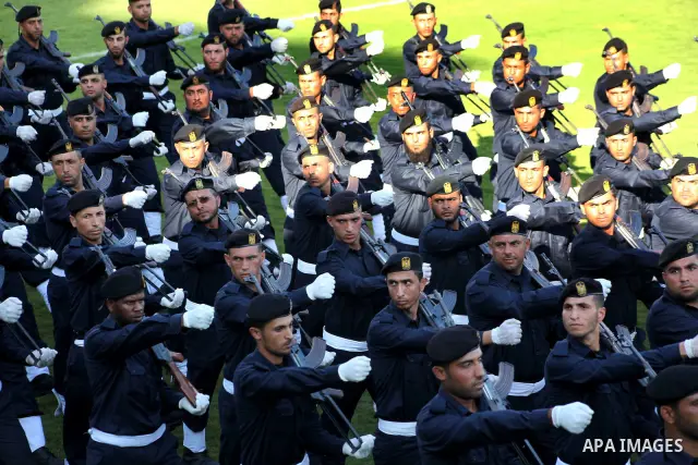 Graduating police officers march during a ceremony at the police academy in Gaza City on June 13, 2012, making them the first batch of officers to graduate after four years of training under the Hamas leadership. Hamas h...