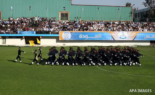 Graduating police officers march during a ceremony at the police academy in Gaza City on June 13, 2012, making them the first batch of officers to graduate after four years of training under the Hamas leadership. Hamas h...