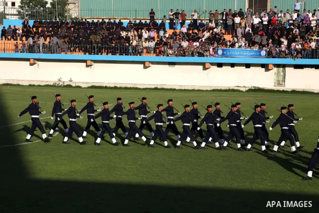 Graduating police officers march during a ceremony at the police academy in Gaza City on June 13, 2012, making them the first batch of officers to graduate after four years of training under the Hamas leadership. Hamas h...