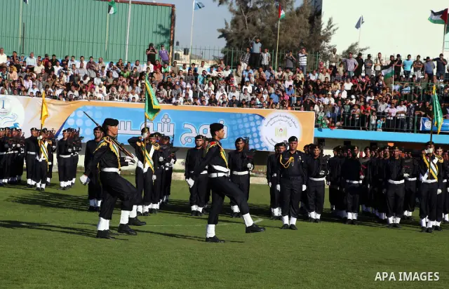 Graduating police officers march during a ceremony at the police academy in Gaza City on June 13, 2012, making them the first batch of officers to graduate after four years of training under the Hamas leadership. Hamas h...
