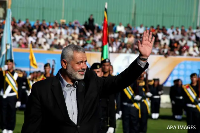 Palestinian Prime Minister in Gaza Ismail Hanyeh, participates graduation police officers ceremony at the police academy in Gaza City on June 13, 2012, making them the first batch of officers to graduate after four years...