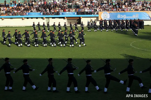Graduating police officers march during a ceremony at the police academy in Gaza City on June 13, 2012, making them the first batch of officers to graduate after four years of training under the Hamas leadership. Hamas h...