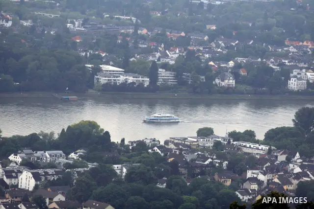 A ship in the River Rhine near the city of Bonn in Germany on 15 June 2012. The Rhine is one of the longest and most important rivers in Europe. It runs for over 1,232 km .Rhine flows through six countries -Switzerland,...