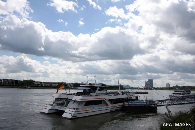 Ships in the River Rhine near the city of Bonn in Germany on 15 June 2012. The Rhine is one of the longest and most important rivers in Europe. It runs for over 1,232 km .Rhine flows through six countries -Switzerland, P...