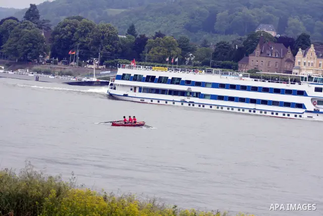 Ships in the River Rhine near the city of Bonn in Germany on 15 June 2012. The Rhine is one of the longest and most important rivers in Europe. It runs for over 1,232 km .Rhine flows through six countries -Switzerland, P...