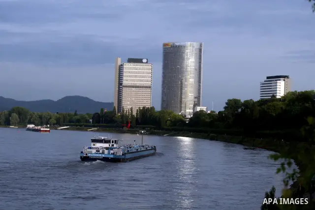 A ship in the River Rhine near the city of Bonn in Germany. The Rhine is one of the longest and most important rivers in Europe. It runs for over 1,232 km .Rhine flows through six countries -Switzerland, Principality of...