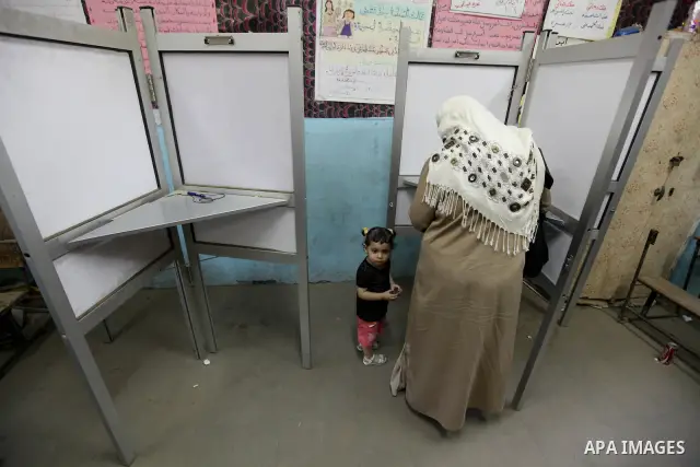 Egyptian women vote at a polling station in Cairo, Egypt on Saturday, June 16, 2012. Egyptians voted Saturday in the country's landmark presidential runoff, choosing between Hosni Mubarak's ex-prime minister and an Islam...