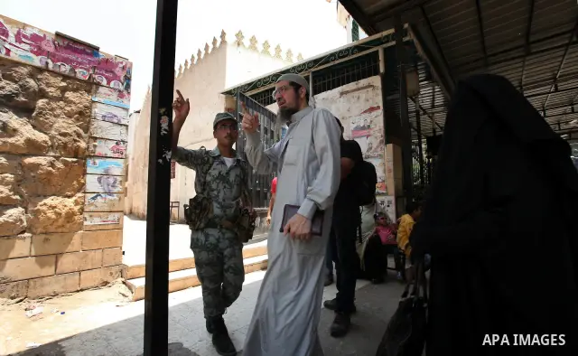 Voter out from a polling station after casting their vote during the second day of voting in Egypt's presidential election in Cairo June 17, 2012. A second day of voting on Sunday will deliver Egypt's first freely electe...