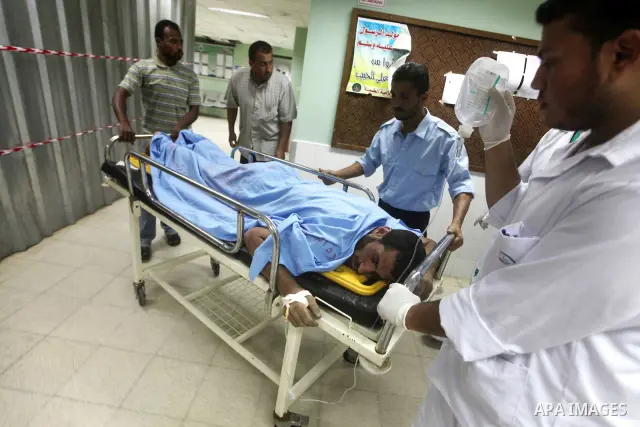 A Palestinian wounded man arrives to Al Aqsa hospital in the central Gaza Strip town of Deir Al Balah, on 17 June 2012. Israeli forces opened fire after incursion Gaza east border about 300 meters. Photo by Ashraf Amra