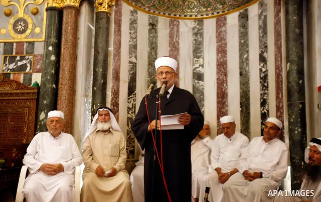 Islamic Singing choir take part in a celebration of the Islamic holiday of Isra Mi'raj in the Al-Aqsa mosque, in the Jerusalem old city, on June 17, 2012. The holiday marks what Muslims believe is Prophet Mohammad's jour...
