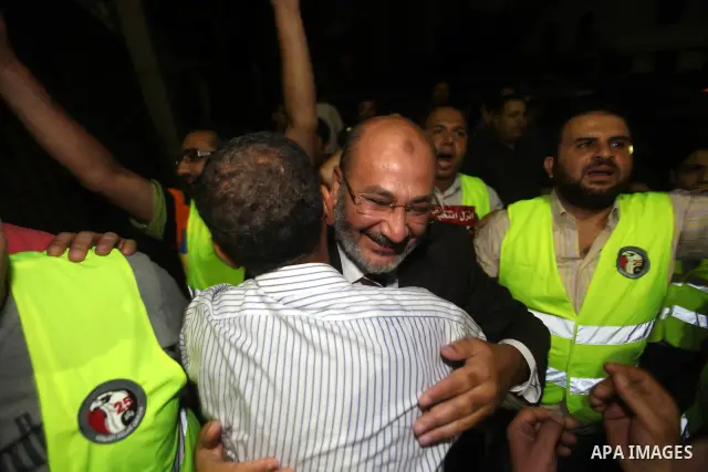 Supporters of Egypt's Muslim Brotherhood candidate Mohammed Mursi celebrate after the announcement of presidential election results in Cairo on June 18, 2012. The campaign of Egyptian presidential candidate Ahmed Shafiq...