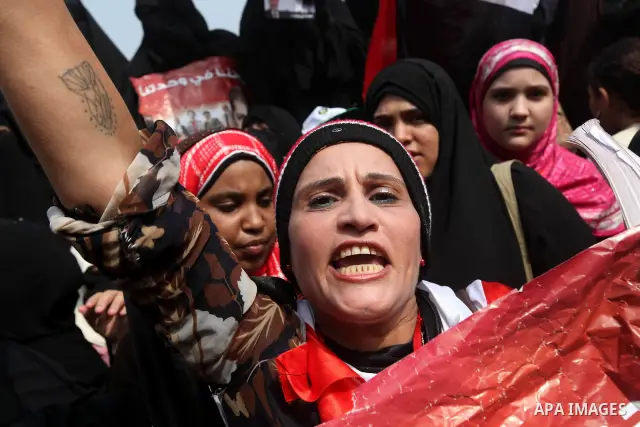 Supporters of presidential candidate Mohammed Morsi carry Egyptian and Muslim Brotherhood flags during celebrations claiming victory in Tahrir Square, Cairo, Egypt, Monday, June 18, 2012. The Muslim Brotherhood declared...