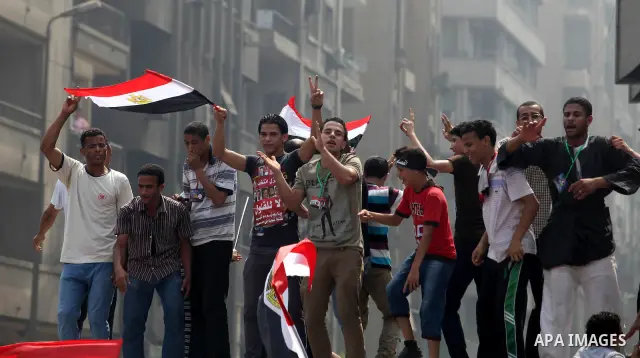 Supporters of Egypt's Muslim Brotherhood candidate Mohammed Morsi celebrate in Tahrir square after the Brotherhood claimed win in presidential vote, in Cairo, Egypt, 18 June 2012. Hundreds of Muslim Brotherhood supporter...