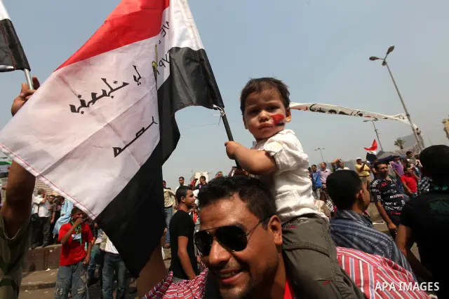 Supporters of Egypt's Muslim Brotherhood candidate Mohammed Morsi celebrate in Tahrir square after the Brotherhood claimed win in presidential vote, in Cairo, Egypt, 18 June 2012. Hundreds of Muslim Brotherhood supporter...