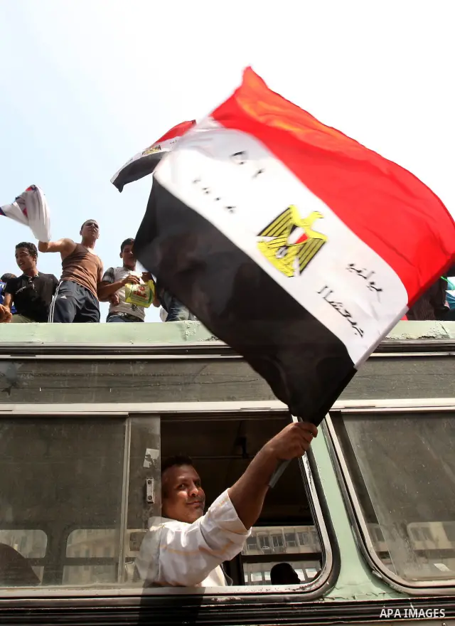 Supporters of Egypt's Muslim Brotherhood candidate Mohammed Morsi celebrate in Tahrir square after the Brotherhood claimed win in presidential vote, in Cairo, Egypt, 18 June 2012. Hundreds of Muslim Brotherhood supporter...