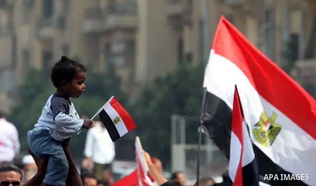 Supporters of Egypt's Muslim Brotherhood candidate Mohammed Morsi celebrate in Tahrir square after the Brotherhood claimed win in presidential vote, in Cairo, Egypt, 18 June 2012. Hundreds of Muslim Brotherhood supporter...