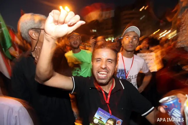 Supporters of Egypt's Muslim Brotherhood presidential candidate Mohammed Morsi celebrate after the Brotherhood claimed win in presidential vote, in Tahrir square, Cairo, Egypt, 18 June 2012. Hundreds of Muslim Brotherhoo...