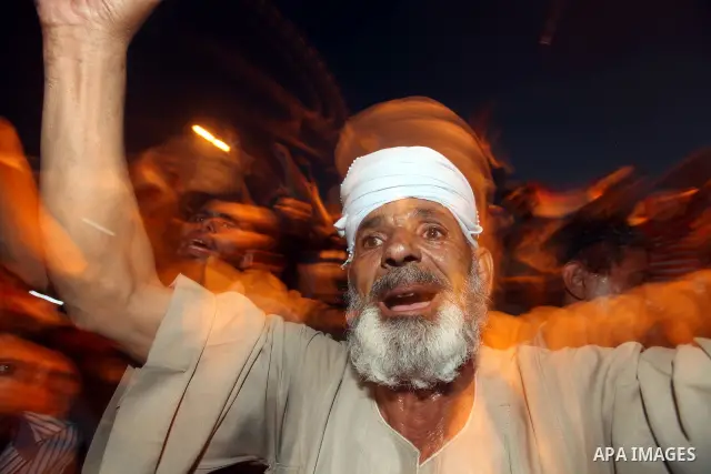 Supporters of Egypt's Muslim Brotherhood presidential candidate Mohammed Morsi celebrate after the Brotherhood claimed win in presidential vote, in Tahrir square, Cairo, Egypt, 18 June 2012. Hundreds of Muslim Brotherhoo...