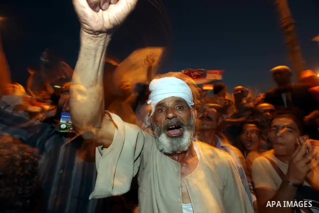 Supporters of Egypt's Muslim Brotherhood presidential candidate Mohammed Morsi celebrate after the Brotherhood claimed win in presidential vote, in Tahrir square, Cairo, Egypt, 18 June 2012. Hundreds of Muslim Brotherhoo...