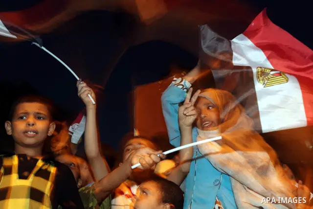 Supporters of Egypt's Muslim Brotherhood presidential candidate Mohammed Morsi celebrate after the Brotherhood claimed win in presidential vote, in Tahrir square, Cairo, Egypt, 18 June 2012. Hundreds of Muslim Brotherhoo...