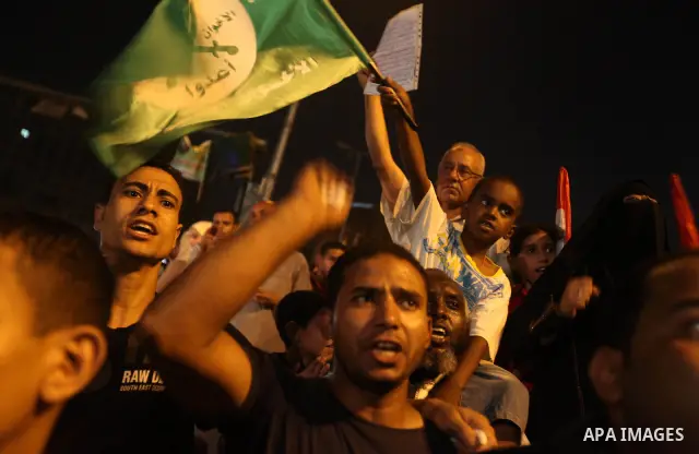 Supporters of Egypt's Muslim Brotherhood presidential candidate Mohammed Morsi celebrate after the Brotherhood claimed win in presidential vote, in Tahrir square, Cairo, Egypt, 18 June 2012. Hundreds of Muslim Brotherhoo...