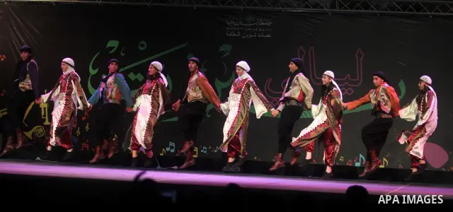 shows members of a local Palestinian dance company presenting their show during a dance festival Beir Ziet Nights (Liali Ber Ziet) at Ber Ziet University near the West Bank town of Ramallah, 18 June 2012. Photo by Issam...