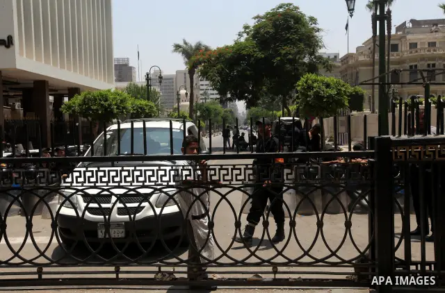 An Egyptian child stands in front of riot police blocking the access to the street of the parliament in Cairo, Egypt, 09 June 2012. A new constitutional document issued by the Supreme Council of the Armed Forces (SCAF),...