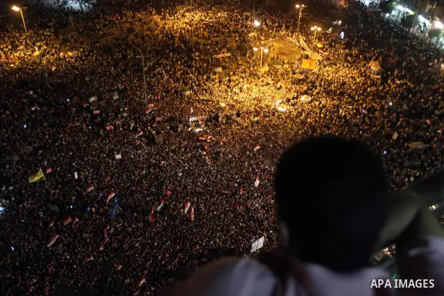 General view shows Egyptian protesters shouting slogans against the new constitutional document and the military council after the Brotherhood claimed win in presidential vote, in Tahrir square, Cairo, Egypt, 19 June 201...