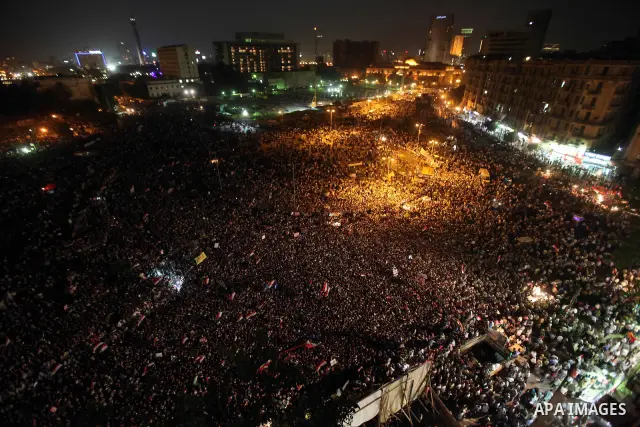 General view shows Egyptian protesters shouting slogans against the new constitutional document and the military council after the Brotherhood claimed win in presidential vote, in Tahrir square, Cairo, Egypt, 19 June 201...