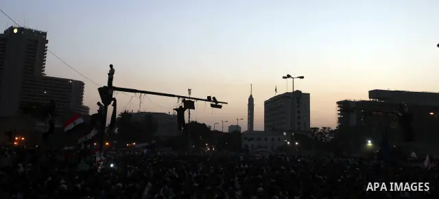 Egyptian Muslim Brotherhood supporters attend prayers during an anti ruling military council demonstration in Tahrir Square, Cairo, Egypt Tuesday, June 19, 2012. A campaign spokesman for Hosni Mubarak's ex-prime minister...
