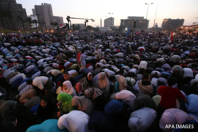 Egyptian Muslim Brotherhood supporters attend prayers during an anti ruling military council demonstration in Tahrir Square, Cairo, Egypt Tuesday, June 19, 2012. A campaign spokesman for Hosni Mubarak's ex-prime minister...