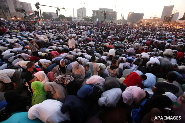 Egyptian Muslim Brotherhood supporters attend prayers during an anti ruling military council demonstration in Tahrir Square, Cairo, Egypt Tuesday, June 19, 2012. A campaign spokesman for Hosni Mubarak's ex-prime minister...