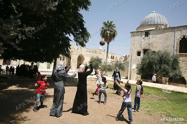 Palestinian children participate in summer camps at Al-Aqsa mosque in the old city of Jerusalem on 20 June 2012. Photo by Mahfouz Abu Turk.