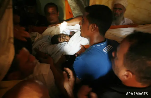 Palestinian mourners carry the body of 6-year-old Ali al-Shwaf during his funeral in Khan Younis, southern Gaza Strip, Saturday, June 23, 2012. Gaza's militant Hamas rulers threatened to escalate fighting with Israel on...