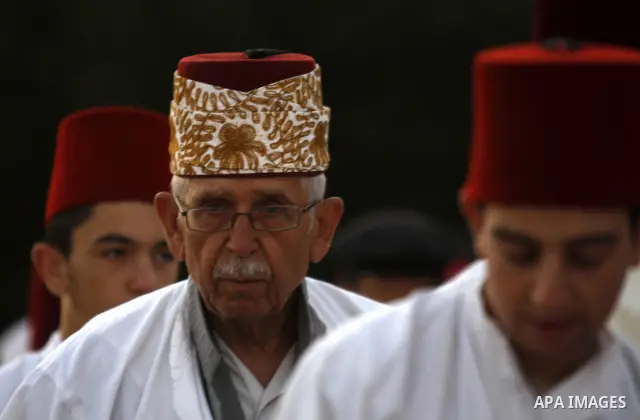 Samaritans attend Shavuot festival on Mount Gerizim near the northern West Bank city of Nablus on June 24, 2012 which is giving of the Torah at Mount Sinai seven weeks after the exodus of the Jewish people from Egypt. Th...