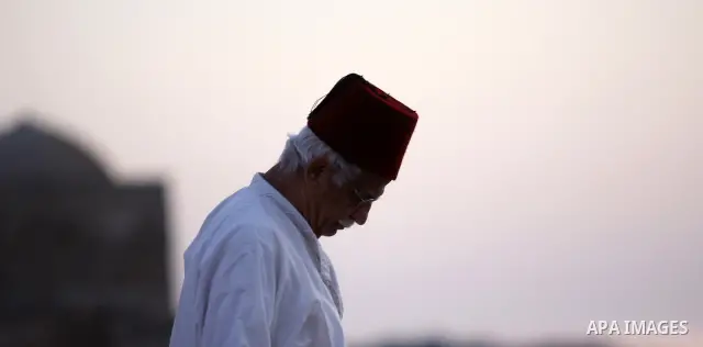 Samaritans attend Shavuot festival on Mount Gerizim near the northern West Bank city of Nablus on June 24, 2012 which is giving of the Torah at Mount Sinai seven weeks after the exodus of the Jewish people from Egypt. Th...