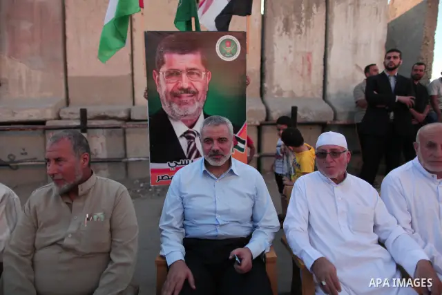 Hamas Prime Minister Sheikh Ismael Haneiya celebrates with Palestinian people, in Gaza City, Gaza, 24 June 2012, after the Egyptian Presidential election committee announced Mohamed Morsi as victor. The Muslim Brotherhoo...