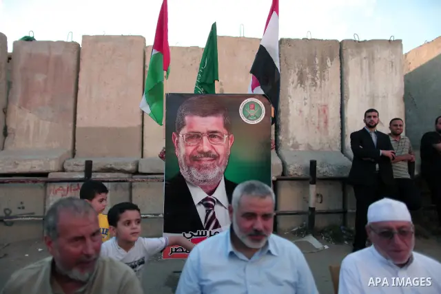 Hamas Prime Minister Sheikh Ismael Haneiya celebrates with Palestinian people, in Gaza City, Gaza, 24 June 2012, after the Egyptian Presidential election committee announced Mohamed Morsi as victor. The Muslim Brotherhoo...