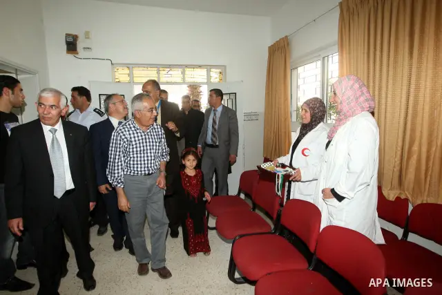 Palestinian Prime Minister, Salam Fayyad attends the opening of several centers in Hebron, in the West Bank of Hebron on June 24, 2012. Photo by Mahmoud Hrebat
