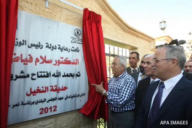 Palestinian Prime Minister, Salam Fayyad attends the opening of several centers in Hebron, in the West Bank of Hebron on June 24, 2012. Photo by Mahmoud Hrebat