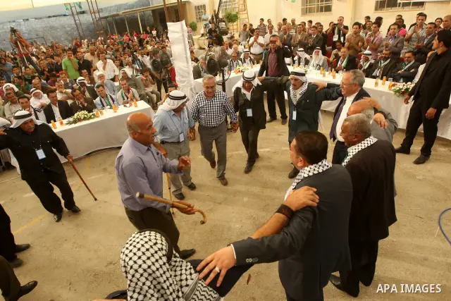 Palestinian Prime Minister, Salam Fayyad attends the opening of several centers in Hebron, in the West Bank of Hebron on June 24, 2012. Photo by Mahmoud Hrebat